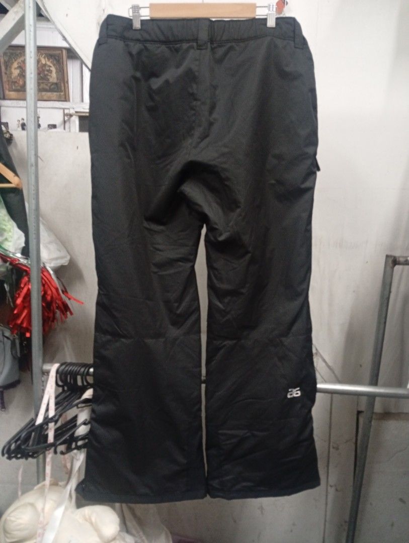 Arctix Black Ski Pants Regular Fit Men's Size L (Category: Trousers) located in Manila. Submitted by annemanzano120906 (Listing ID 1462552735, Image 2). Description: - Brand: Arctix - Type: Ski Pants - Gender: Men's - Fit: Regular - Size: L - Material: Durable and warm fabric with smooth inner lining - Features: Elasticated waistband, ankle zippers for boot access - Origin: Made in Bangladesh - Ideal for: Ski trips and cold weather activities.