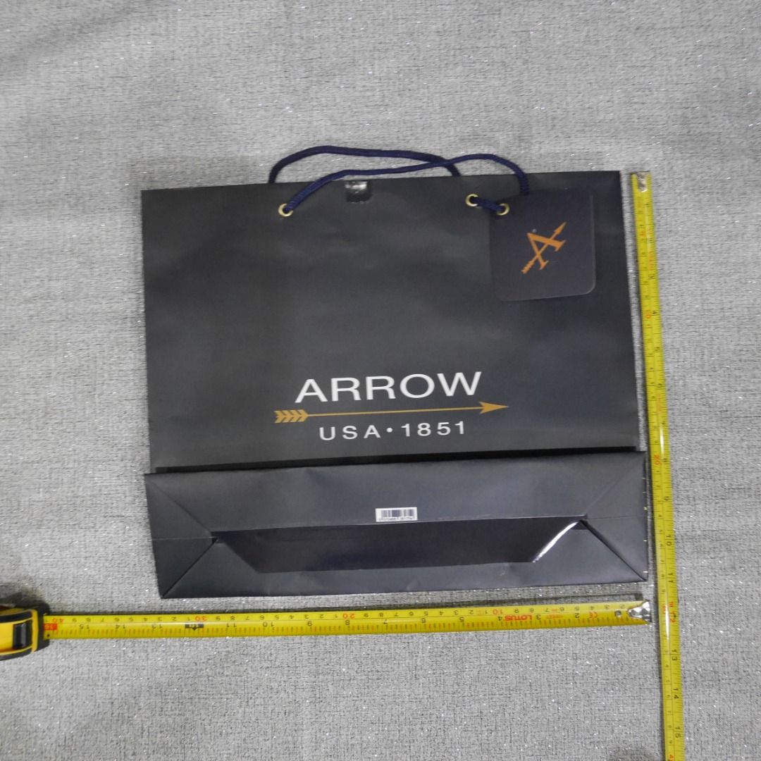 Arrow Paper Bag with gift tag (Category: Other Stationery & Craft) located in Valenzuela. Submitted by cletini (Listing ID 1462629530, Image 3). Description: Condition Statement (Very Important): • Authentic: Guaranteed 100% original. • Swipe photos for paper bag size • The paper bag was used only once to transport the purchased item. • Condition : Please see photos for actual item and condition. • Transparency: I have inspected the bag and taken