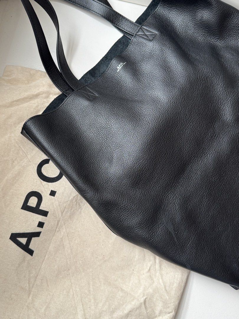 Auth APC Tote Bag (Category: Tote Bags) located in Pasay City. Submitted by shop.stylestaple (Listing ID 1462516077, Image 1). Description: - Classic black leather tote - Brand: A.P.C. - Simple and spacious design - Great for everyday use - Nice leather texture - Comes with original dust bag - Versatile and fits a lot Bought for 26,000 Used once only Selling for 18500.