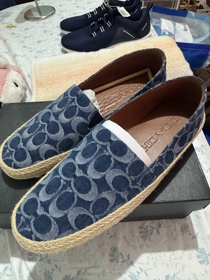 AUTHENTIC Coach Denim Signature Espadrille Flats (Category: Flats & Sandals) located in Cainta. Submitted by trufflecake (Listing ID 1462531842, Image 2). Description: - Coach espadrille flats in signature denim print - Comfortable slip-on style - Jute rope trim around the sole - Coach logo embossed on insole and outsole - Ideal for casual wear.
