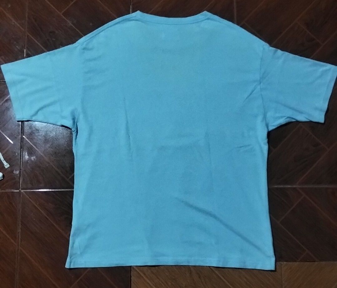 Authentic Donsmoke Cloud Graphic T-shirt "I Dont Smoke" (Category: Tshirts & Polo Shirts ) located in Cabuyao City. Submitted by klarenx (Listing ID 1462470996, Image 2). Description: Brand: Donsmoke (Authentic) ₱300 + sf Size: Small (S) Dimes: W(20) x L(26) Color: Light Blue / Cyan Condition: Pre-owned (8/10). Nicely taken care of, minor normal wash wear around the collar seam. Graphic print and tags are completely intact. Authenticity Guarantee