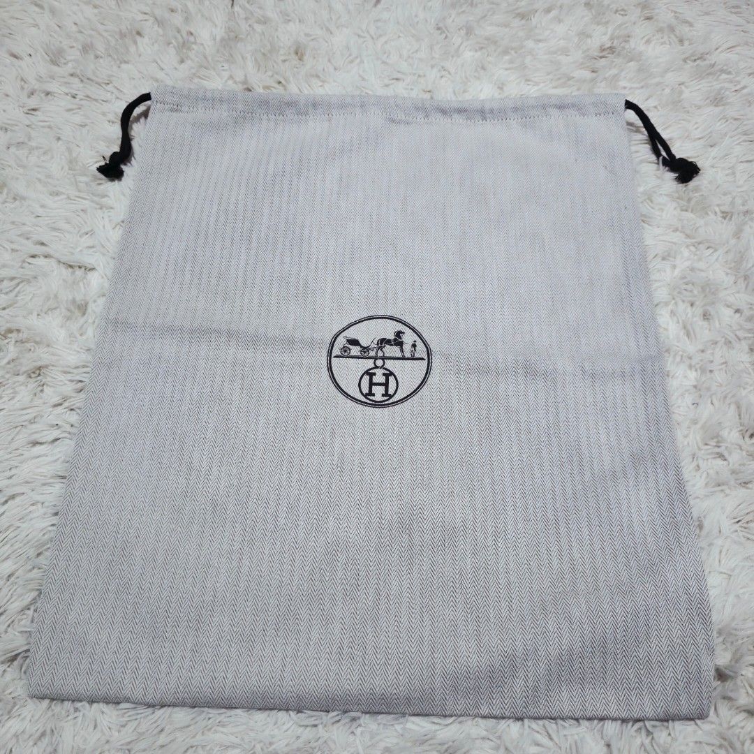 Authentic Hermes Dust Bag 17x15 inches (Category: Luxury Bags & Wallets) located in Manila. Submitted by jfluxury.co (Listing ID 1462649990, Image 2). Description: excellent condition like new no flaws bought in Japan 🇯🇵 💯% Authentic. 😊 Money back guarantee. 😊 Clean and ready to use na.