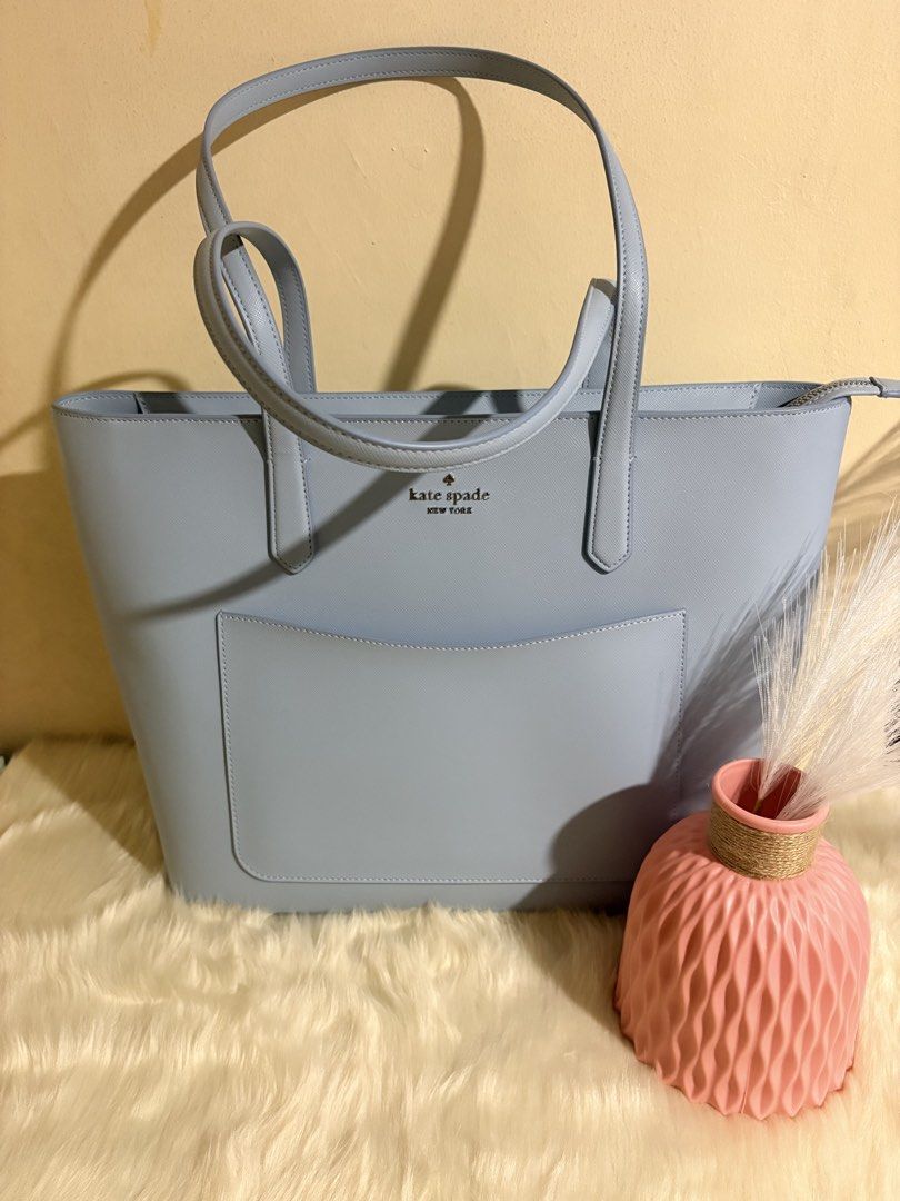 Authentic Kate Spade Tote Bag 🩵 (Category: Tote Bags) located in Pasig City. Submitted by anjlaroyacloset (Listing ID 1462572111, Image 1). Description: used once only purchase from 🇺🇸 with tags Rfs: decluttering .