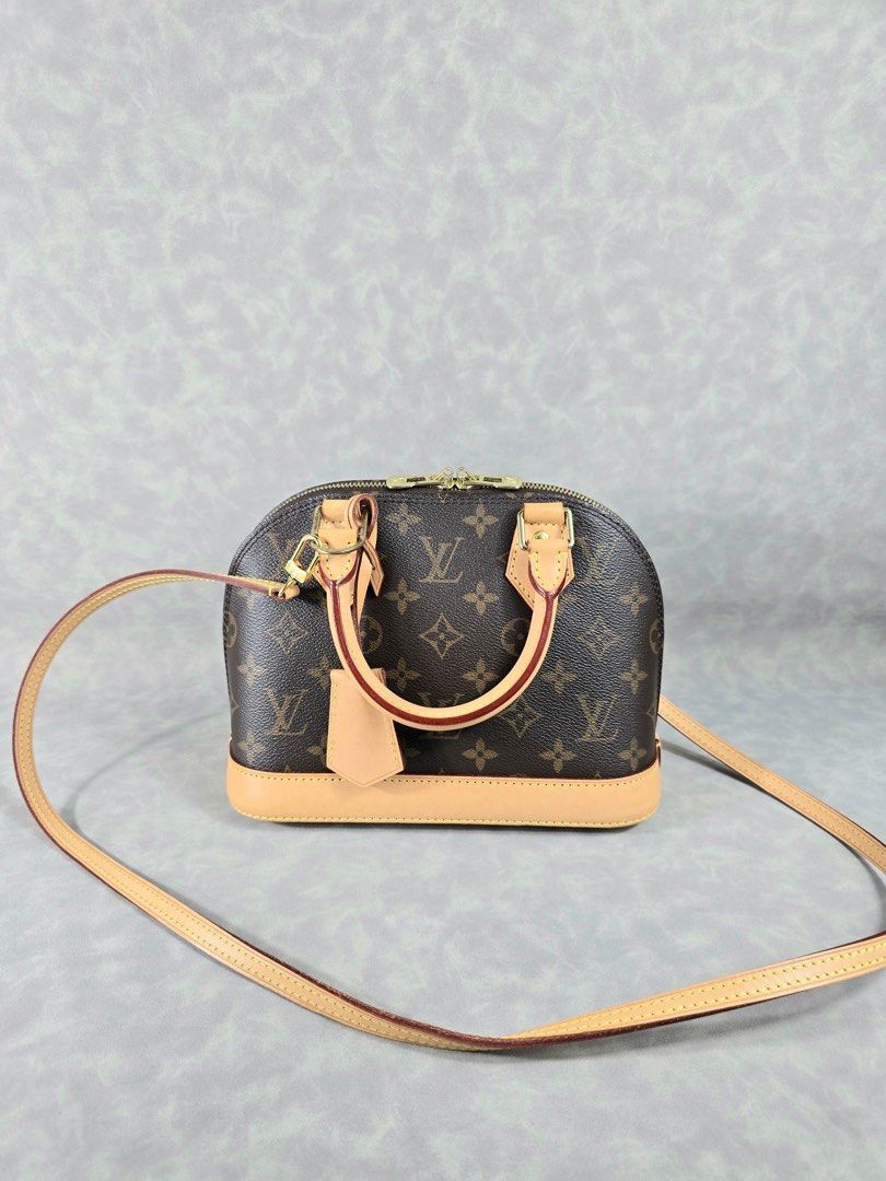 Authentic Louis Vuitton BB Alma Monogram (Category: Luxury Bags & Wallets) located in Taguig. Submitted by luxchelry (Listing ID 1462584834, Image 2). Description: Alma BB Monogram(Microchip) ♦️Comes with detachable strap, lock and keys, entrupy, box and paperbag ♦️9.2/10 ♦️Any discoloration is due to lighting only. ✨️P59000✨️ 📍Taguig All items are 100% authentic. Money back guarantee if the item is proven fake. Disclaimer: All product names, lo
