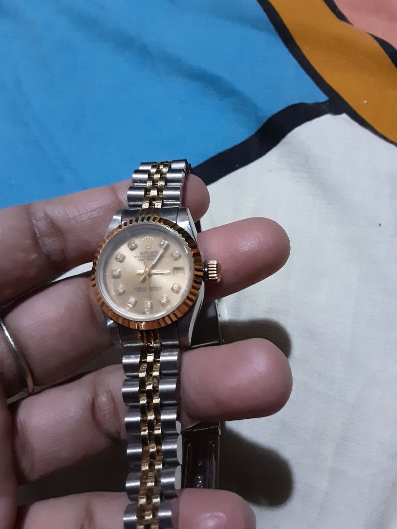 Automatic watch （分類：手錶）位於 Hong Kong。 由 lowbudgetshopping2026 提交（商品編號 1462583087，圖片 2）。簡介： Selling a Rolex Datejust watch. Two-tone stainless steel and gold. Champagne dial with diamond hour markers. Fluted bezel. Jubilee bracelet. Clasp has Rolex logo. Watch has some signs of wear. Please check photos for details.working send by sf frre sf fees.gd copy。