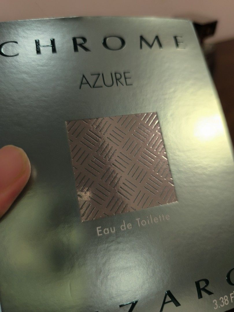 Azzaro Chrome Azure Eau de Toilette 100ml (Category: Fragrance & Deodorants) located in Cavite. Submitted by iammrsdr (Listing ID 1462499825, Image 3). Description: 💎 AZZARO CHROME AUTHENTICITY Glass Lettering: The branding is cleanly molded directly into pristine, crystal-clear glass. Solid Cap: The square cap has a heavy, solid metallic feel and snaps tightly. Batch Codes: The code stamped on the box matches the code engraved on the bottle bot