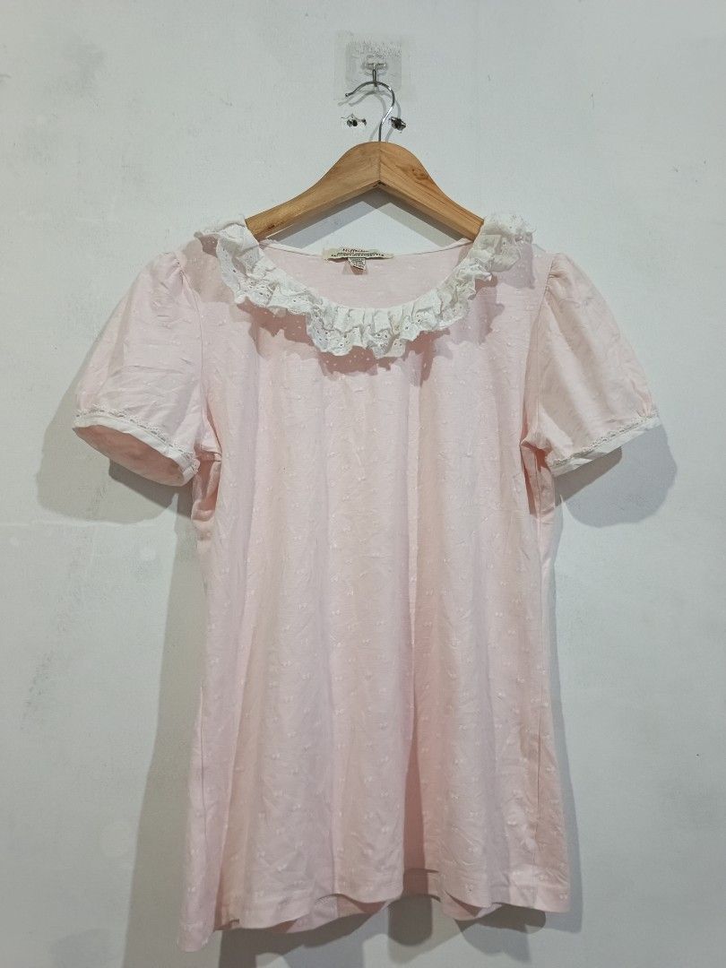 Babydoll top (Category: Blouses) located in Manila. Submitted by dear__riri__ (Listing ID 1462448479, Image 1). Description: - Adorable pink top - Features a charming white lace collar and trim - Short, sweet puff sleeves - All-over textured dot pattern - Estimated size M - Ideal for a cute, vintage aesthetic.