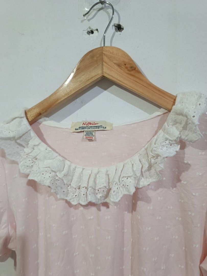 Babydoll top (Category: Blouses) located in Manila. Submitted by dear__riri__ (Listing ID 1462448479, Image 2). Description: - Adorable pink top - Features a charming white lace collar and trim - Short, sweet puff sleeves - All-over textured dot pattern - Estimated size M - Ideal for a cute, vintage aesthetic.