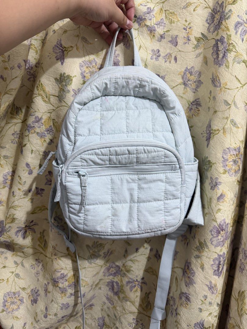 BAGSMART Quilted Mini Backpack Light Blue (Category: Backpacks) located in Binan City. Submitted by prelovedlagunaph (Listing ID 1462620233, Image 1). Description: - Cute light blue quilted mini backpack from BAGSMART. - Main compartment with an inner zip pocket. - Front zip pocket for smaller items. - Convenient side pockets. - Ideal for everyday use or travel. - Made in China..