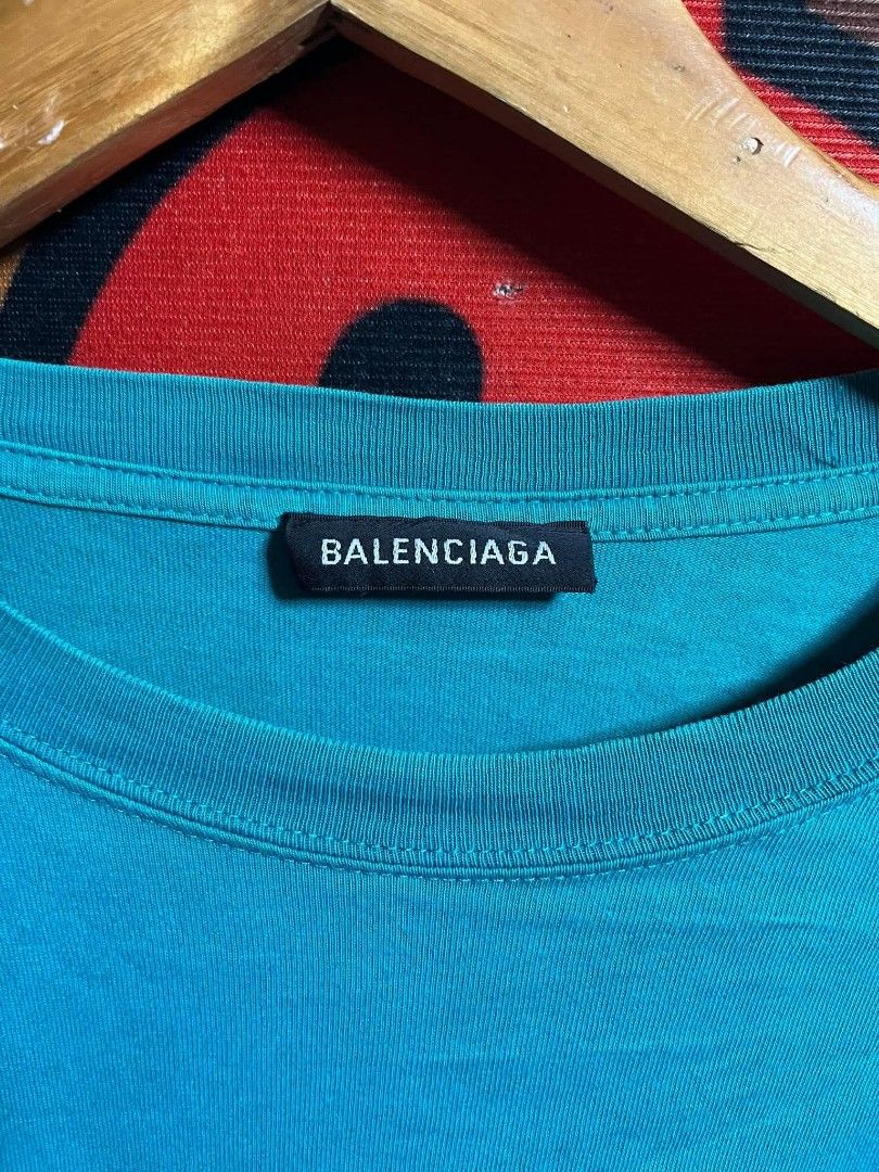 Balenciaga (Category: Tshirts & Polo Shirts ) located in Taguig. Submitted by bimbyanche19839 (Listing ID 1462610706, Image 3). Description: Balenciaga Size: Med-Large Width: 21.5 Length: 28.5 Color Rate: 9.5/10 Good Condition Issue: Washable Stain 🏷️250php plus ship 📍Taguig Location.