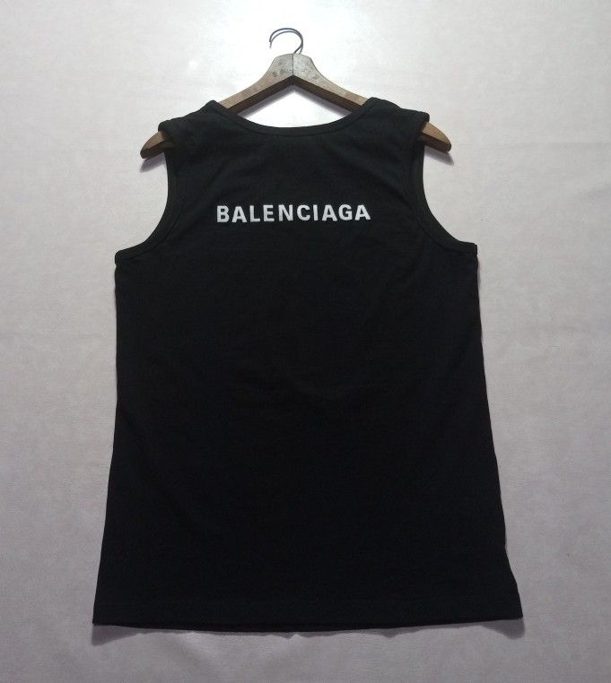 Balenciaga Embroidered Tank Top (Category: Luxury Apparel) located in Urdaneta. Submitted by josephragontonjr95 (Listing ID 1462511863, Image 2). Description: - Balenciaga Embroidered Tank Top - SIZE: Medium - DIMENSIONS ⬇️⬇️⬇️ - WIDTH: 19-24 - LENGTH: 27 - COLOR RATE: 9.8/10 - ISSUES/FLAWS: NONE - CONDITION: AS NEW - 2,150 + SHIPPING FEE.