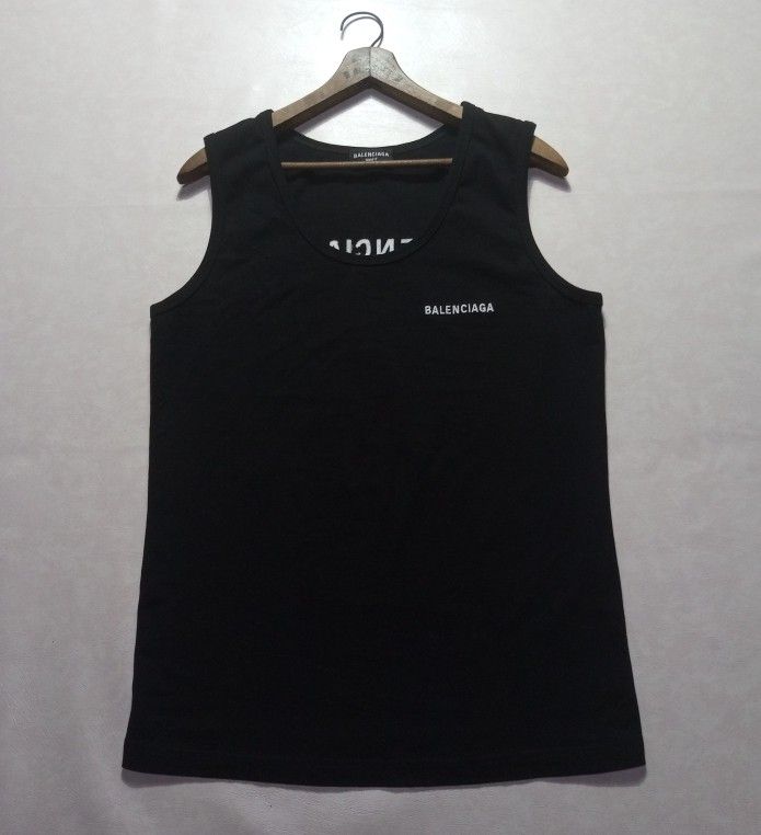 Balenciaga Embroidered Tank Top (Category: Luxury Apparel) located in Urdaneta. Submitted by josephragontonjr95 (Listing ID 1462511863, Image 1). Description: - Balenciaga Embroidered Tank Top - SIZE: Medium - DIMENSIONS ⬇️⬇️⬇️ - WIDTH: 19-24 - LENGTH: 27 - COLOR RATE: 9.8/10 - ISSUES/FLAWS: NONE - CONDITION: AS NEW - 2,150 + SHIPPING FEE.