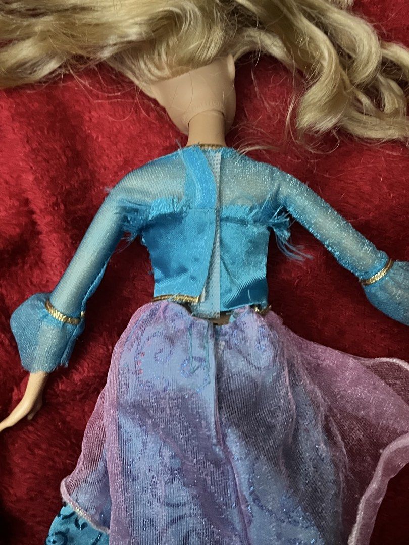 Barbie movie doll ( rosella) (Category: Figurines & Statues) located in Manila. Submitted by happydays.com (Listing ID 1462613652, Image 3). Description: - Barbie Movie Doll -Island princess Rosella Flaws Not singing 2 pcs bald spot Has damages on gown -See photos for reference.