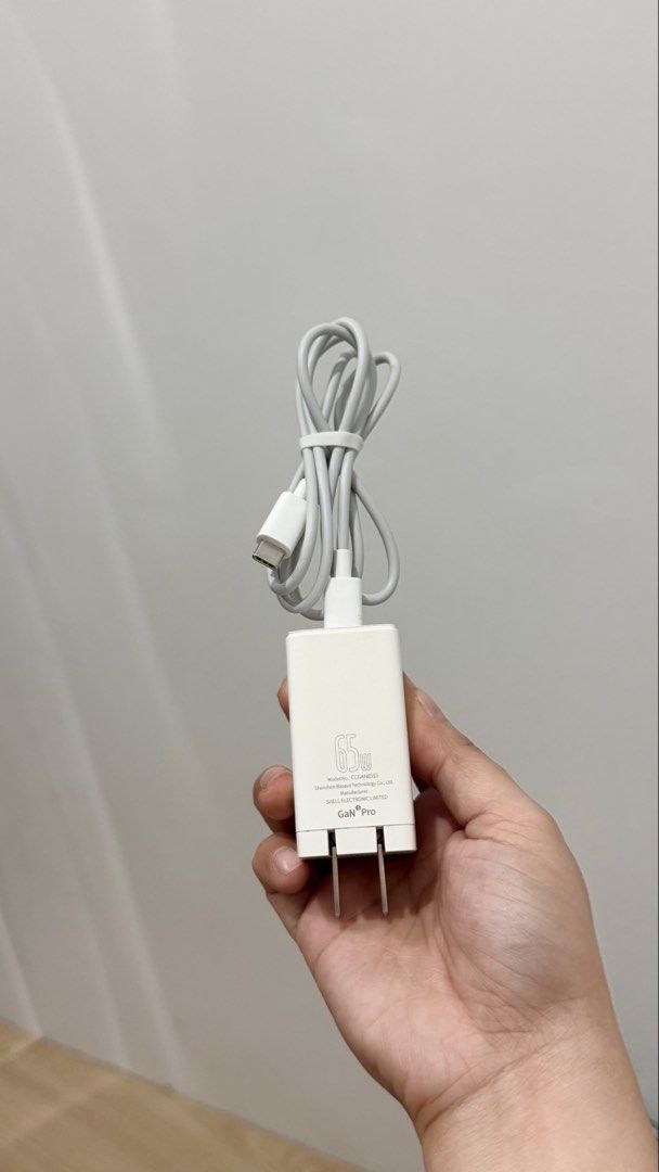 Baseus 65W GaN5 Pro USB Type C Charger 2C+U White (Category: Chargers & Cables) located in Malabon City. Submitted by jonaaa.xyz (Listing ID 1462640370, Image 2). Description: - Baseus 65W GaN5 Pro Charger - Color: White - Ports: 2x USB-C, 1x USB-A - Fast Charging Capable - Includes 1x White USB-C Cable.