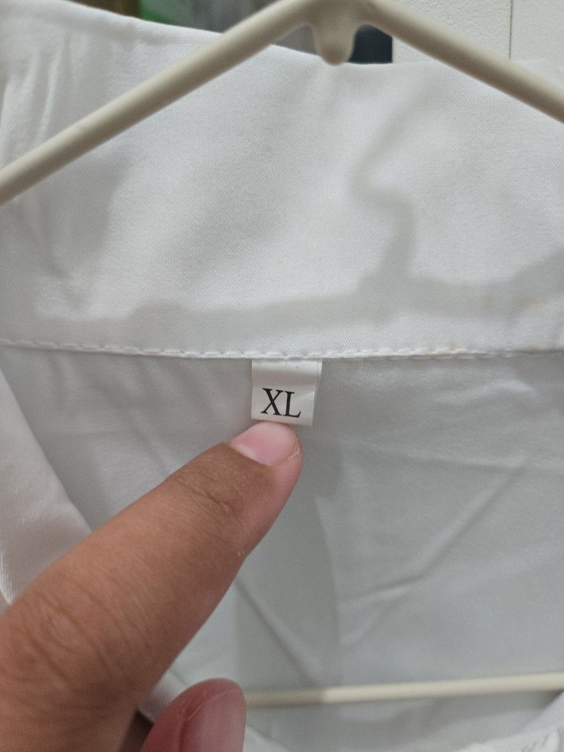 Basic White Top - Tiktok Shop (Category: Blouses) located in Agoncillo. Submitted by ariannacvii (Listing ID 1462442476, Image 2). Description: 👚 Pre-Loved Basic White Top — ₱85 I’m currently decluttering my wardrobe and letting go of some of my pre-loved clothes! 🤍 • Size: XL • Brand: Tiktok Shop • Condition: New (No Tag) • Price: ₱85 ✨ Perfect for casual, everyday outfits and easy to style! 📌 IMPORTANT NOTE: Some of my clothes have been stor