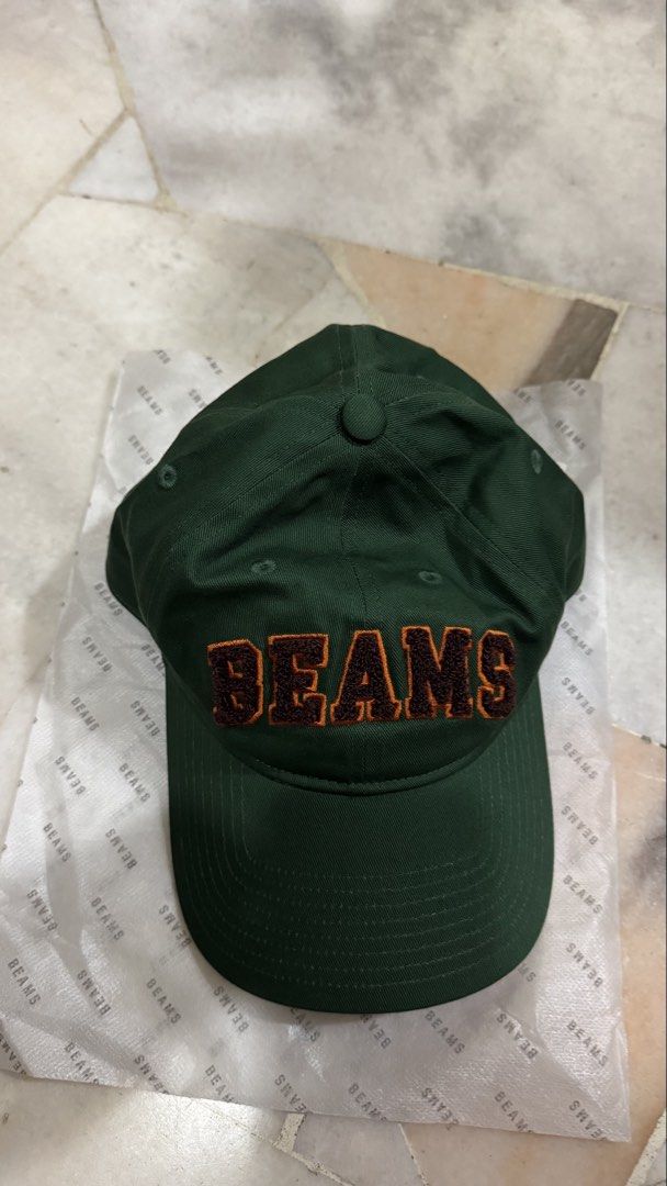 BEAMS Basic 2026 Cap. (Category: Cap & Hats) located in Petaling Jaya. Submitted by facktura (Listing ID 1462609857, Image 2). Description: Brand new with tag. A bold statement cap featuring a prominent Sagara embroidery logo. The textured, three-dimensional finish adds a distinctive accent to this classic year-round essential. Head circumferance : 50-65cm. Authentic Beams product from Japan. .