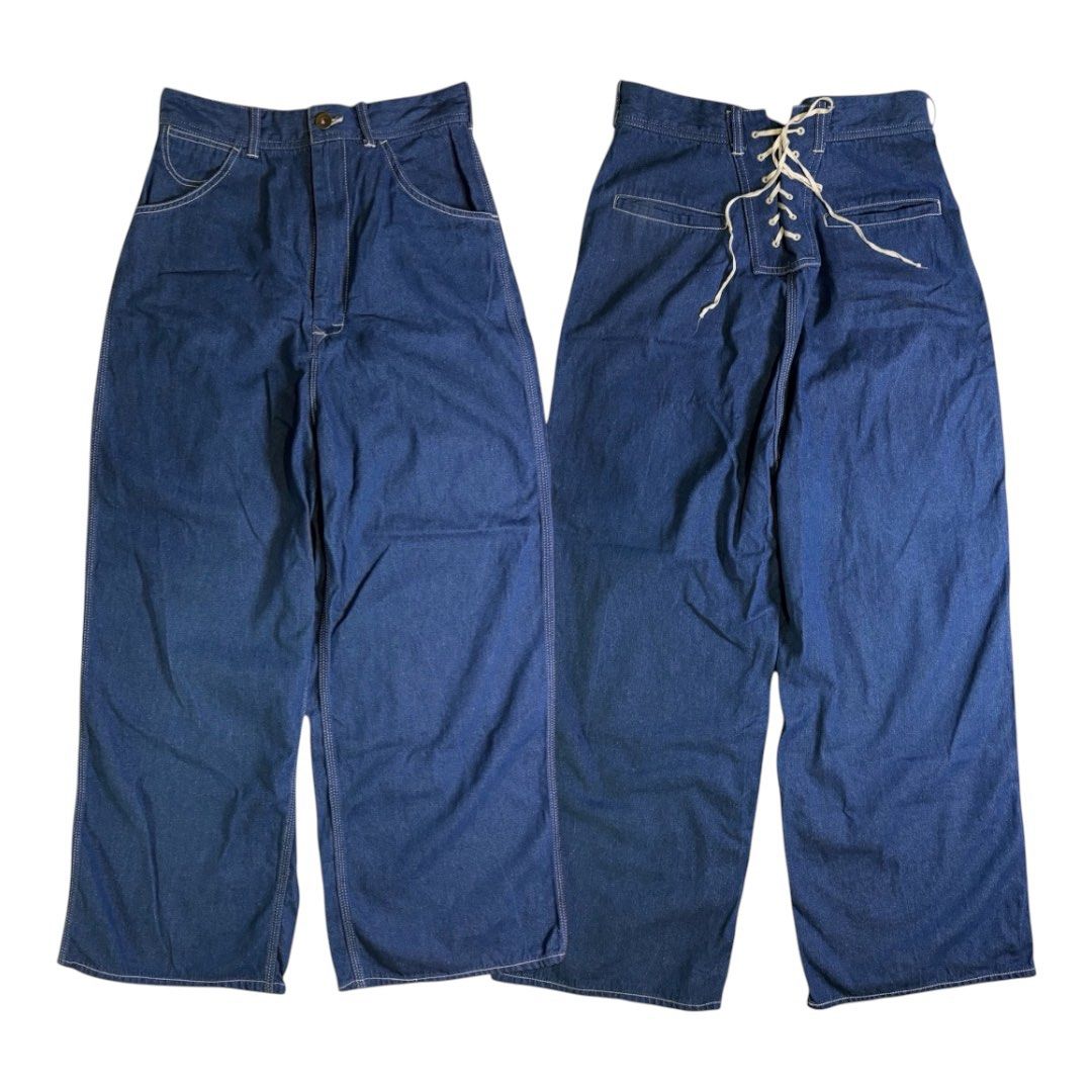 BEAMS BOY Lace-up Work Pants (Category: Jeans) located in Abucay. Submitted by esangbalakalang (Listing ID 1460524313, Image 1). Description: These BEAMS BOY Lace-up Work Pants showcase a distinct wide-leg silhouette heavily inspired by vintage 1930s military deck pants and traditional naval sailor uniforms. Crafted from a mid-weight, deep indigo blue denim, the centerpiece of the design is a prominent, contrast-stitched corset lace-up panel inte