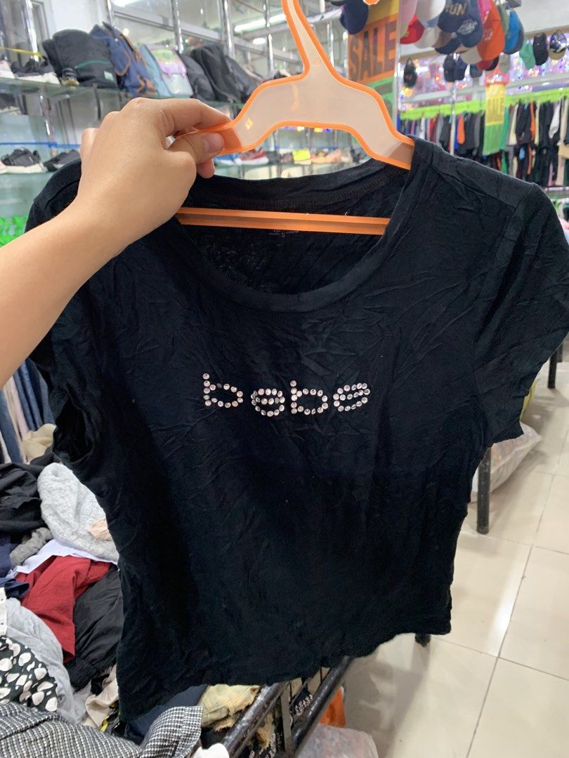 Bebe Shirt (Category: Shirts) located in Kabankalan. Submitted by leans_closet (Listing ID 1462611335, Image 2). Description: Darker in actual Color may vary due to lighting S-m Two missing rhinestones.