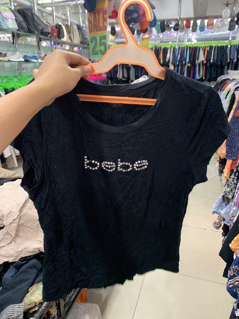 Bebe Shirt (Category: Shirts) located in Kabankalan. Submitted by leans_closet (Listing ID 1462611335, Image 3). Description: Darker in actual Color may vary due to lighting S-m Two missing rhinestones.