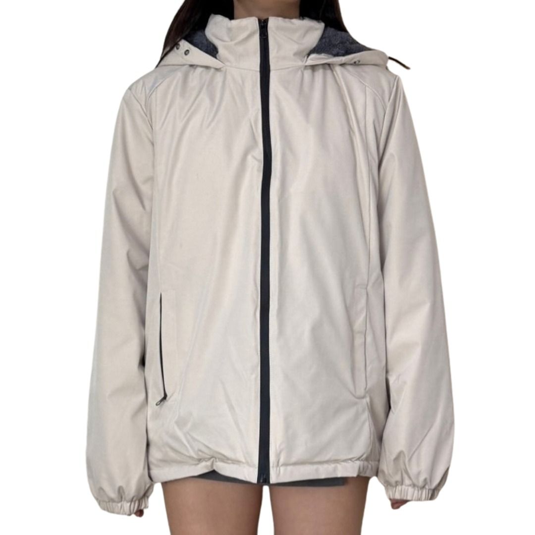 Beige Hooded Zip-Up Jacket (Category: Coats, Jackets and Outerwear) located in Davao. Submitted by oreoswithpeanutbutter (Listing ID 1462557445, Image 1). Description: FREE SHIPPING from DAVAO FREE DELIVERY within DAVAO - Lightweight beige jacket - Attached hood - Zip-up front closure - Elasticated cuffs and hem - Two front pockets - Ideal for layering or light rain protection - Packable and easy to wear.