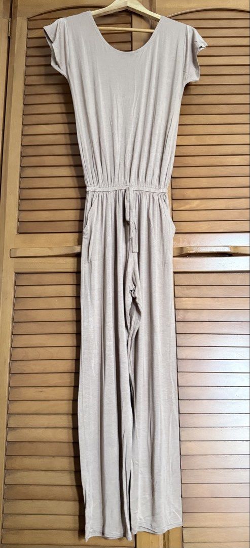 Beige Jumpsuit with Drawstring Waist and Pockets (Category: Jumpsuits) located in Paranaque City. Submitted by roanclauds (Listing ID 1462536007, Image 1). Description: - Comfy beige cotton jumpsuit - Elasticated drawstring waist with tie - Side pockets - Short sleeves - Relaxed fit - Ideal for casual wear - Easy to style - Fits S-M body frame.