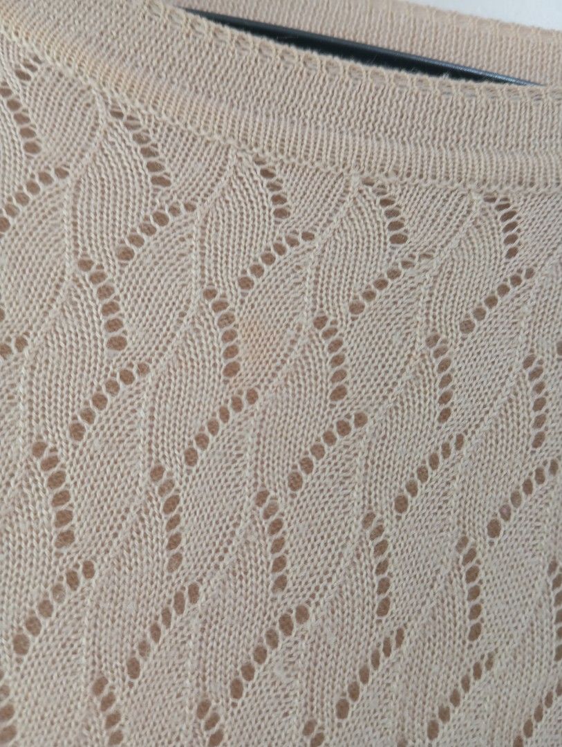 Beige Knit Top with Diamond Pattern (Category: Sleeveless) located in Manila. Submitted by brion123 (Listing ID 1462440852, Image 2). Description: - Light beige short-sleeved knit top - Features a pretty diamond pattern throughout - Nice textured fabric - Small mark on fabric near shoulder (see last photo) - Perfect for casual wear.
