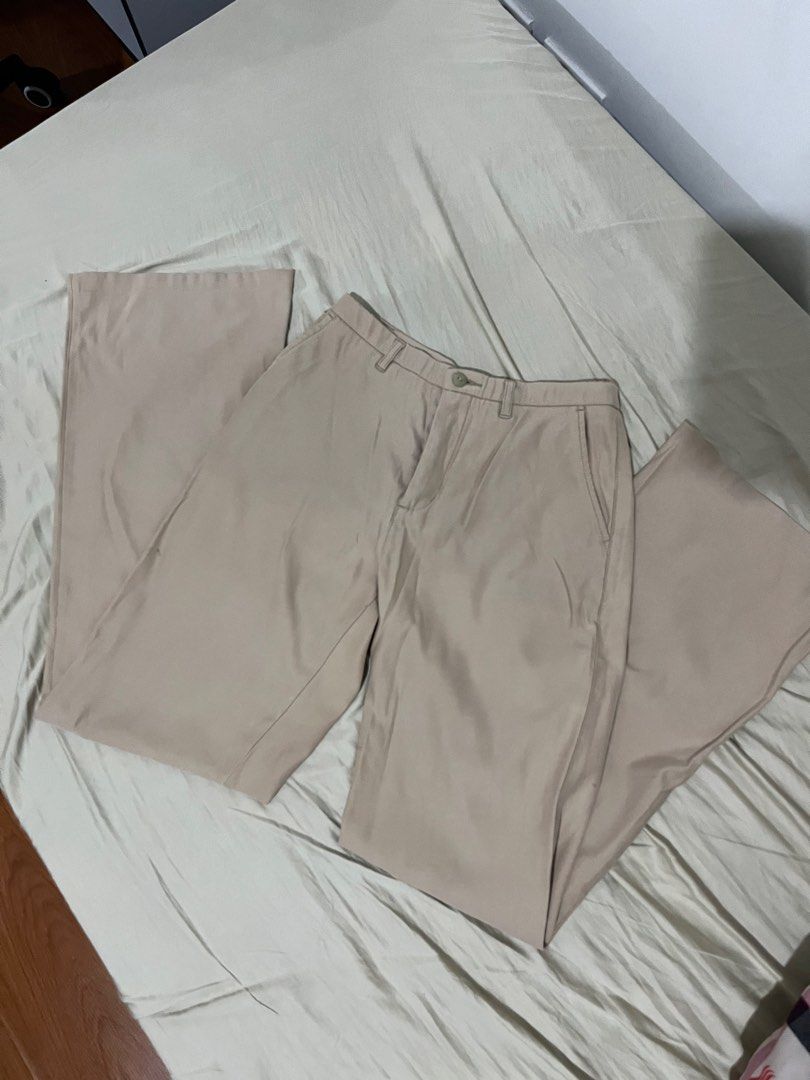Beige Wide Leg Trousers (Category: Other Bottoms) located in Manaoag. Submitted by thedaintyarts (Listing ID 1462614726, Image 3). Description: - Beige wide leg trousers - Button and zip closure - Two front pockets - Flared leg design - Versatile for casual or dressy occasions - Easy to style Size 26-28 Loc Mandaluyong .