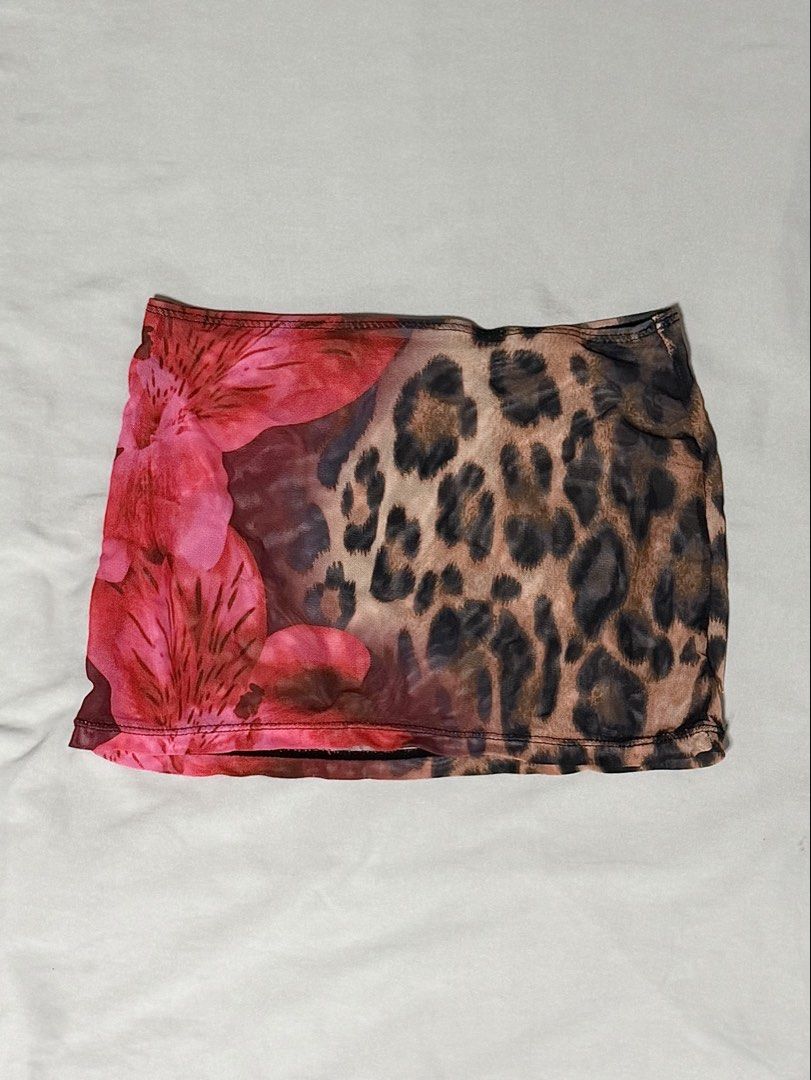 bikini set (Category: Bikinis & Swimsuits) located in Caloocan City. Submitted by chiblonded (Listing ID 1462548886, Image 3). Description: - Adorable bikini set with matching mesh skirt. - Features a chic leopard print with delicate floral accents. - Bikini top with adjustable neck and back ties for a perfect fit. - Easy pull-on mesh skirt. - Ideal for your next beach or pool adventure!.