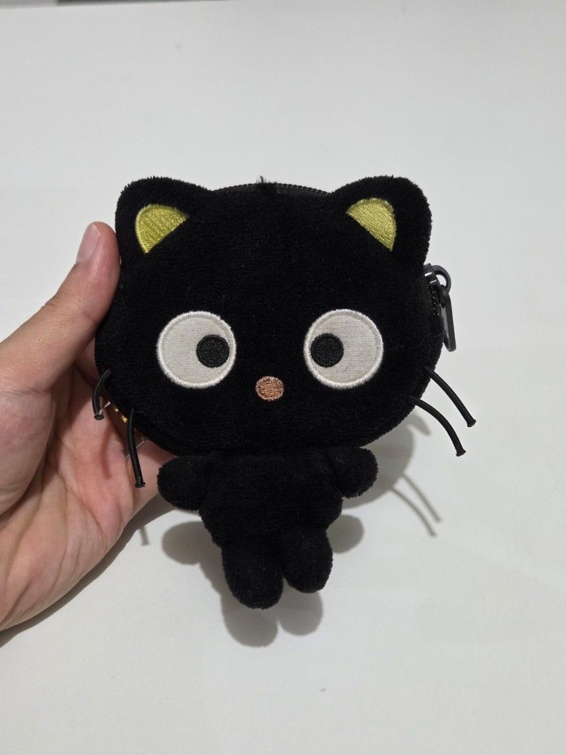 Black Cat Plush Coin Pouch with Zipper (Category: Other Stationery & Craft) located in Quezon City. Submitted by keywayelih (Listing ID 1462629414, Image 1). Description: SELLING P200.00 Black Cat Purse w/ Hook Used RFS: Decluttering MOP: GCash, Maya, Bank Transfer, Cash MOD: Grab, Lalamove, Borzo, Pick-Up Location: West Avenue, Quezon City.