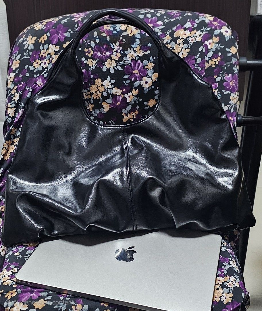 Black Faux Leather Hobo Bag (Category: Shoulder Bags) located in Marikina City. Submitted by anbierose (Listing ID 1462589488, Image 1). Description: - Spacious black hobo bag - Shiny faux leather material - Comfortable shoulder strap - Soft, slouchy shape - Perfect for everyday use - Versatile accessory.