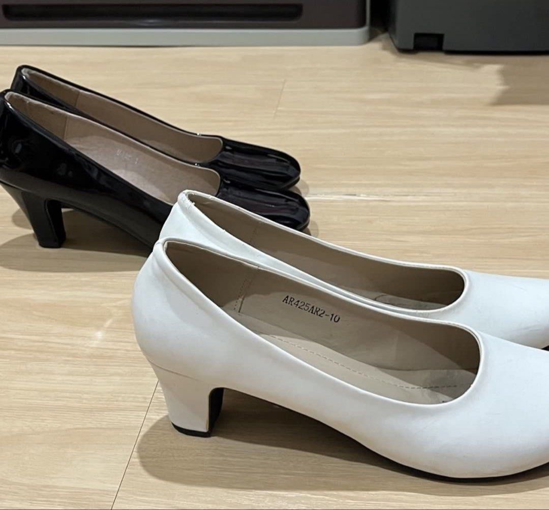 black heels and white heels (bundle) (Category: Heels) located in Quezon City. Submitted by reesedeclutters (Listing ID 1462634046, Image 2). Description: • price: 300 pesos • meroma black heels - size 40; best fits size 9 - 8/10 condition • zanea white heels - labeled size 10 but best fits size 9 - 7/10 condition - with flaws (see pics) - comes with original box • both worn once or twice • im a size 10, and these fit exactly just right, so they’