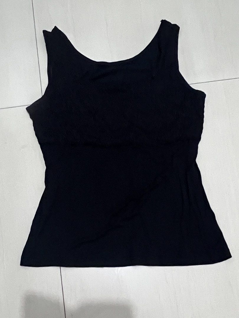 Black Lace Trim Tank Top (Category: Sleeveless) located in Caloocan City. Submitted by guaconerva97479 (Listing ID 1462617646, Image 2). Description: - Classic black tank top - Features a beautiful lace overlay on the chest - Sleeveless design - Ideal for layering or as a standalone piece .