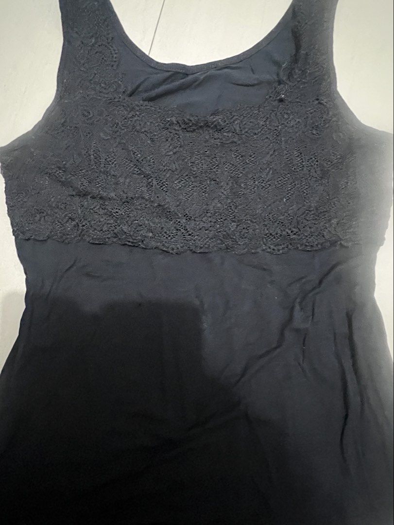 Black Lace Trim Tank Top (Category: Sleeveless) located in Caloocan City. Submitted by guaconerva97479 (Listing ID 1462617646, Image 1). Description: - Classic black tank top - Features a beautiful lace overlay on the chest - Sleeveless design - Ideal for layering or as a standalone piece .