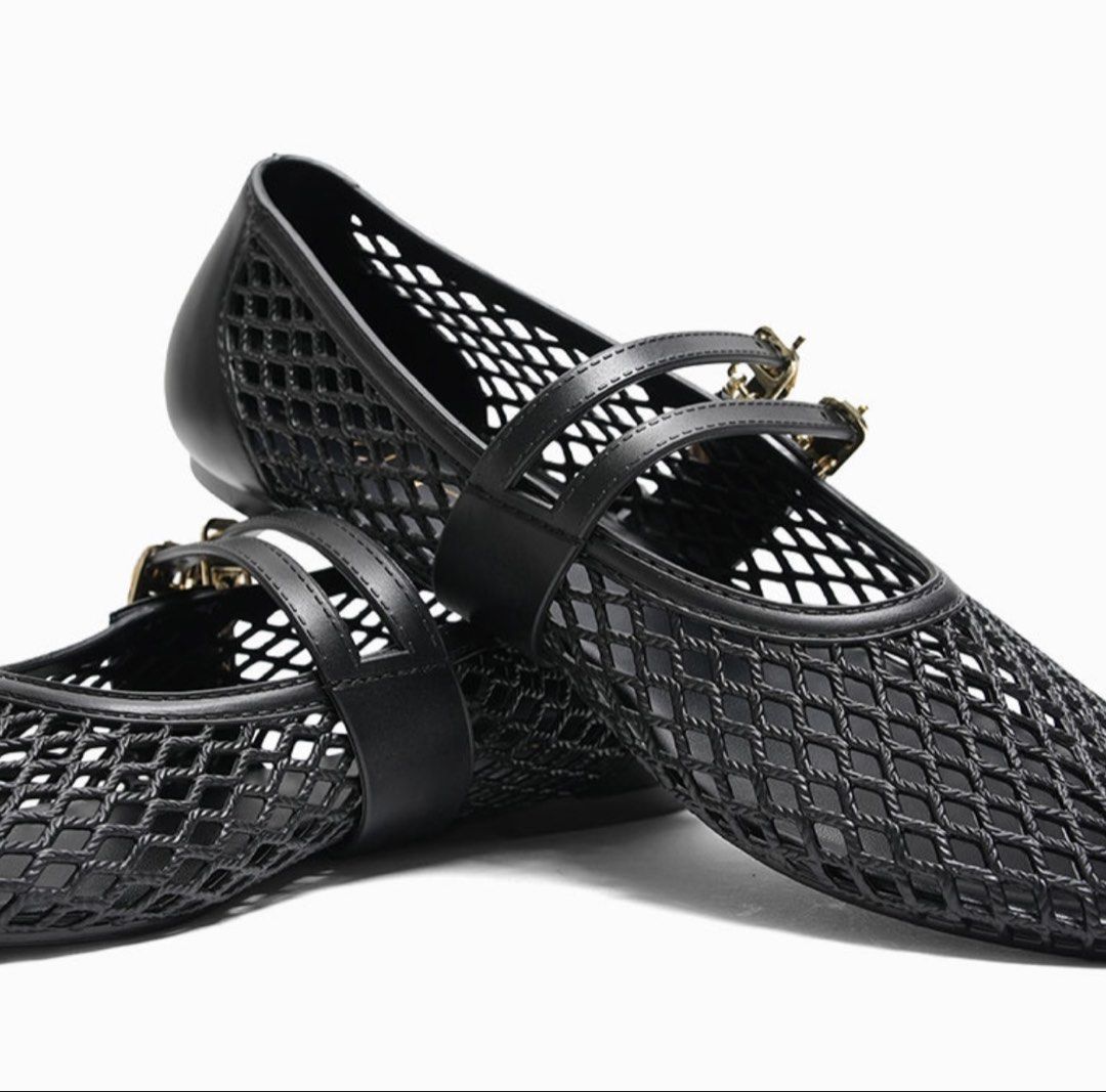 Black Mesh Ballet Flats with Buckle Straps (Category: Flats & Sandals) located in Caloocan City. Submitted by chicgayle202782 (Listing ID 1462591495, Image 2). Description: - Black mesh ballet flats - Features double buckle straps across the top - Pointed toe design - Chic and casual style - Easy to slip on and off - Versatile for various outfits.