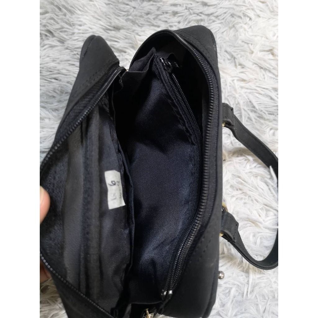 Black Mini Hand bag. (Category: Purses & Pouches) located in Santa Cruz. Submitted by jmy_surplus.2 (Listing ID 1462674078, Image 3). Description: 50% Size: L= 6 , W= 9 Color: black Type: bag Brand: no brand Material: polyester Style: hand bag, mini bag JMY 1 LR-82.