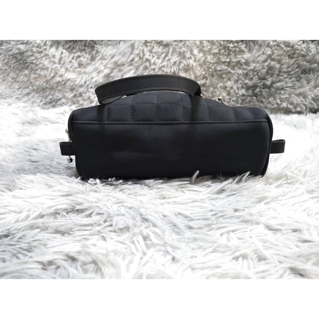 Black Mini Hand bag. (Category: Purses & Pouches) located in Santa Cruz. Submitted by jmy_surplus.2 (Listing ID 1462674078, Image 2). Description: 50% Size: L= 6 , W= 9 Color: black Type: bag Brand: no brand Material: polyester Style: hand bag, mini bag JMY 1 LR-82.
