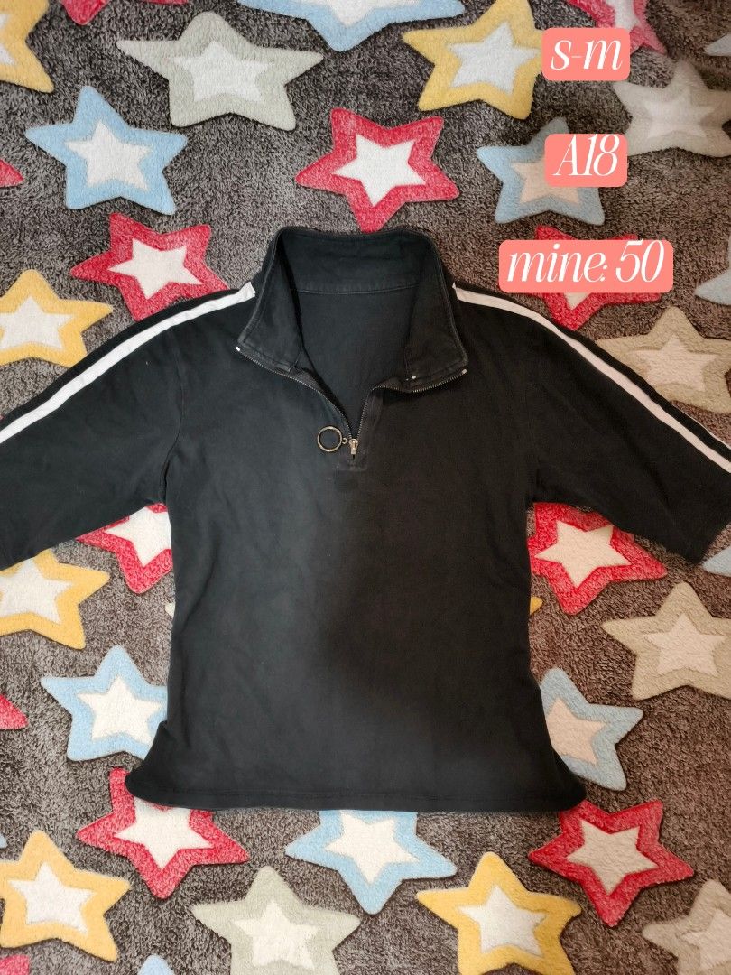 Black Quarter Zip Sweatshirt with White Stripes (Category: Longsleeves) located in Cebu City. Submitted by straw.berry.milk.24 (Listing ID 1462648053, Image 1). Description: - Black sweatshirt - Quarter zip with ring pull - White stripes on sleeves - Stand-up collar - Estimated size: S/M - Ideal for casual wear.