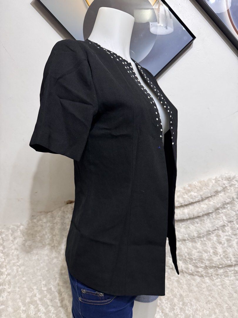 Black Short Sleeve Blazer with White Polka Dot Collar (Category: Coats, Jackets and Outerwear) located in Marikina City. Submitted by lorradel (Listing ID 1462460417, Image 2). Description: - shoulder length 14in - Stylish black blazer with short sleeves. - Features a unique white polka dot detail around the collar. - Open front design for easy wear. - Versatile for smart casual or office attire. - Looks great with jeans or trousers..