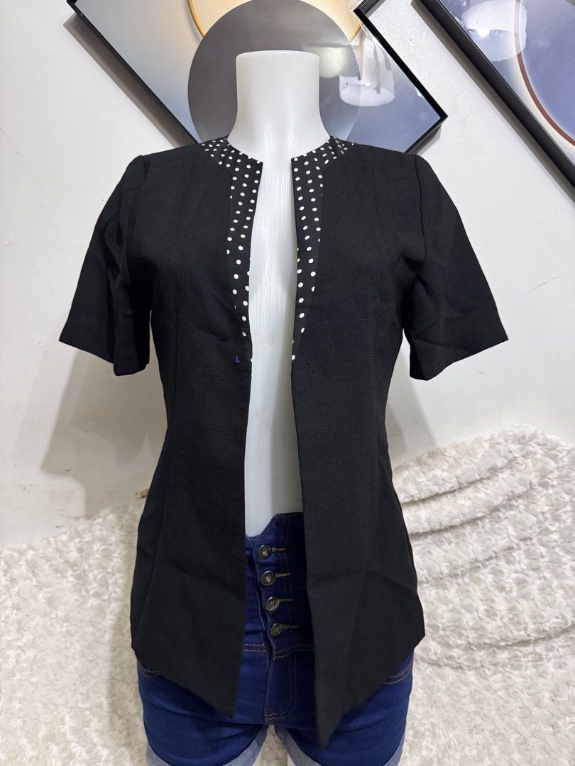 Black Short Sleeve Blazer with White Polka Dot Collar (Category: Coats, Jackets and Outerwear) located in Marikina City. Submitted by lorradel (Listing ID 1462460417, Image 1). Description: - shoulder length 14in - Stylish black blazer with short sleeves. - Features a unique white polka dot detail around the collar. - Open front design for easy wear. - Versatile for smart casual or office attire. - Looks great with jeans or trousers..