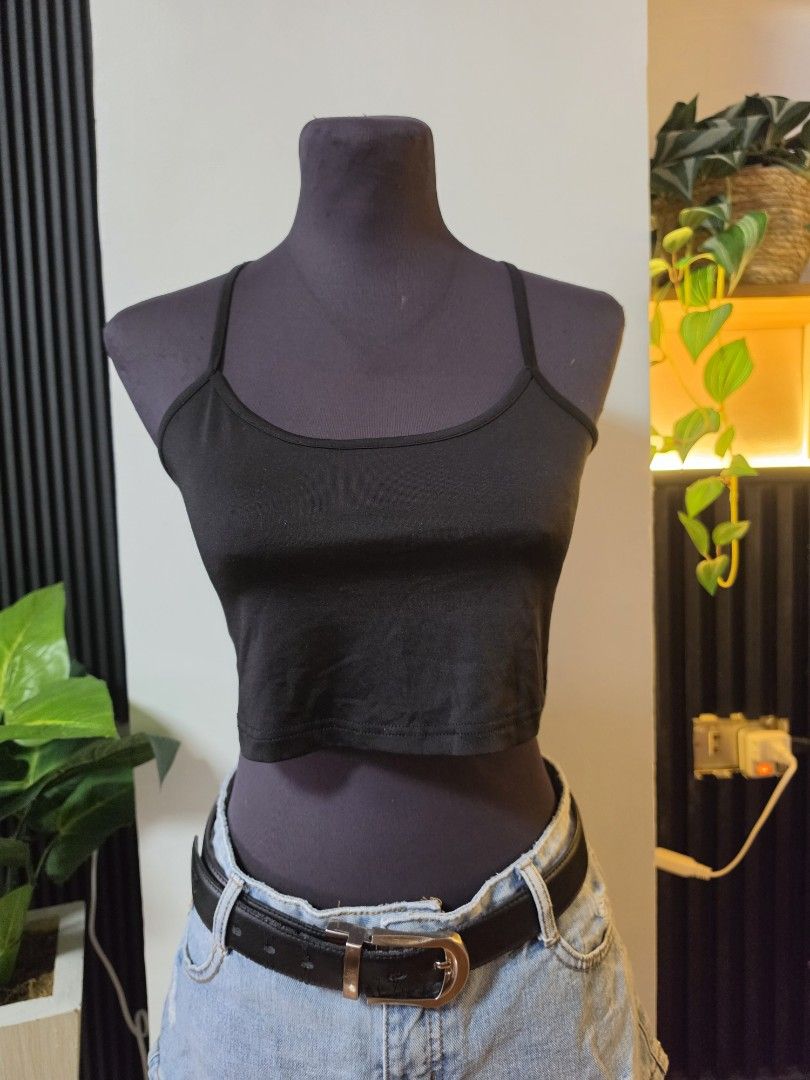 Black Spaghetti Strap Crop Top (Category: Sleeveless) located in Paranaque City. Submitted by franinnashop (Listing ID 1462512334, Image 1). Description: - Basic black spaghetti strap crop top - Stretchy and comfortable material - Pairs well with high-waisted jeans or skirts - Great for layering or wearing on its own - Versatile for casual or dressy occasions declutt3r small paranaqur city.