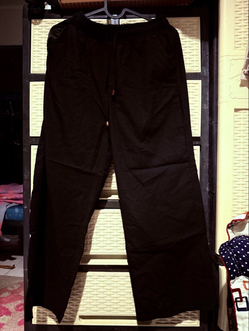 Black Wide Leg Pants with Drawstring Waist (Category: Other Bottoms) located in Manila. Submitted by preownedbyyas (Listing ID 1462642835, Image 1). Description: - Black wide leg pants - Elastic waistband with drawstring - Loose and comfortable fit - Ideal for casual wear - Easy to style - Please check photos for details.