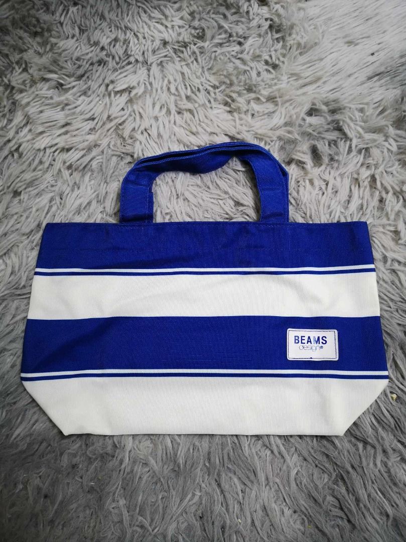 Blue & White Stripe Pattern Tote Bag (Category: Tote Bags) located in Santa Cruz. Submitted by jmy_surplus.2 (Listing ID 1462669402, Image 1). Description: Size ; L - 7.2 W - 11.6 Color ; Blue Type ; Tote Bag Brand ; No brand Material ; Nylon Style ; Stripe Tote Bag LR 129 JMY 1 Batch #221.
