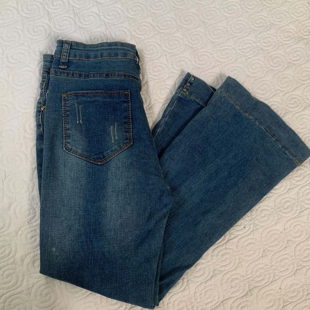 Blue Flare Jeans with Distressed Details (Category: Jeans) located in Cebu City. Submitted by wearbonny (Listing ID 1462483334, Image 2). Description: hw flared boot cut pants size 24 length 35 .