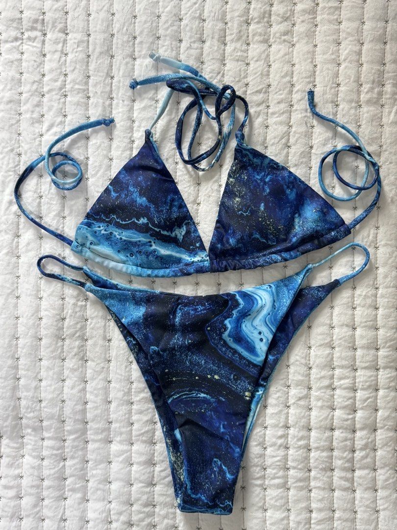 Blue Marble Print Triangle Bikini Set (Category: Bikinis & Swimsuits) located in Taguig. Submitted by yumibearr (Listing ID 1462550024, Image 1). Description: -best fit small -worn once except for the undies .