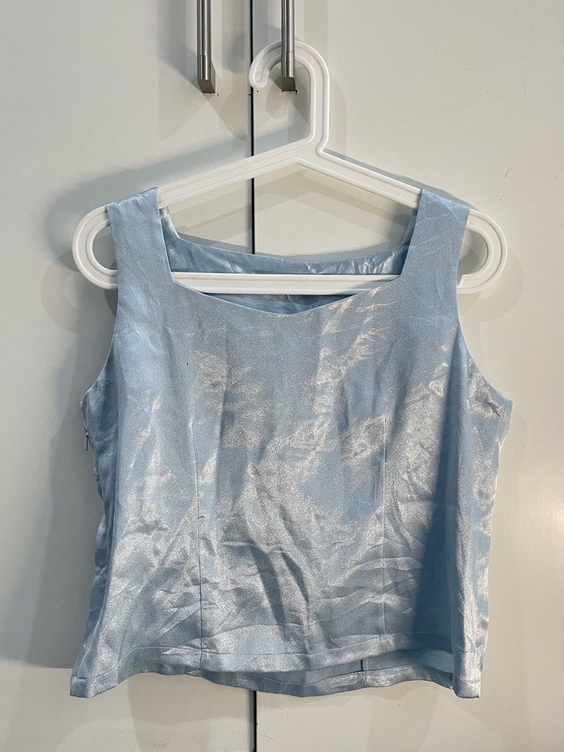 Blue Satin Sleeveless Top (Category: Sleeveless) located in Manila. Submitted by raine.star (Listing ID 1462510325, Image 1). Description: Blue, satin, sleeveless.