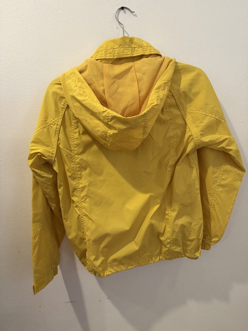 Bossini Yellow Hooded Windbreaker Jacket Size S (Category: Coats, Jackets and Outerwear) located in Makati City. Submitted by jcalmartz (Listing ID 1462440662, Image 3). Description: - Brand: Bossini - Type: Hooded Windbreaker - Color: Yellow - Size: S - Material: Lightweight, ideal for windy days and light rain - Features: Full zip front, pockets, tuckable hood - Style: Casual wear.