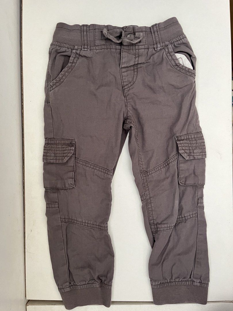 Boys Cargo Pants (Category: Babies & Kids Fashion) located in Las Pinas. Submitted by chelcie.sindhy (Listing ID 1462457280, Image 1). Description: - Grey cargo jogger pants for boys - Elastic waistband with drawstring - Two front pockets - Two cargo pockets on legs - Jogger style with elastic cuffs - Ideal for everyday wear and play.