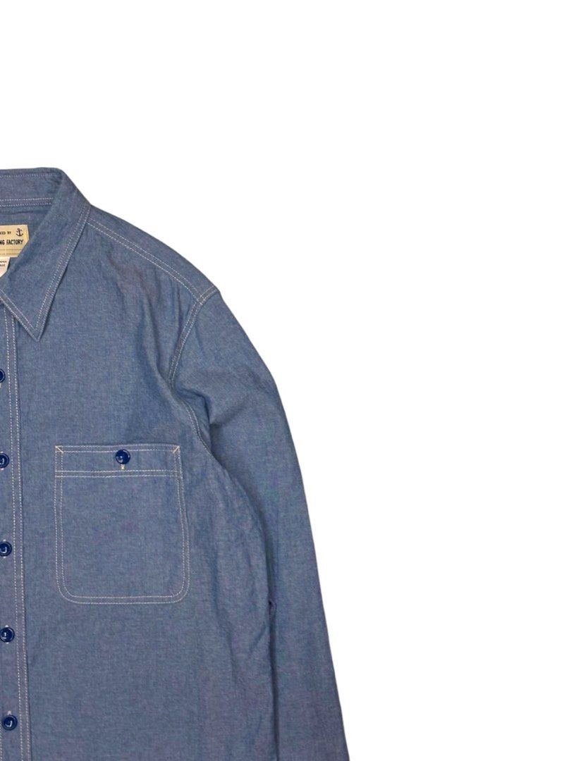 Bronson Mfg. Co. Chambray Work Shirt (Category: Formal Shirts) located in Valenzuela. Submitted by katadatakph (Listing ID 1462624461, Image 2). Description: Bronson Mfg. Co. Chambray Work Shirt Dimes: Width 21.5 Shoulders 18 Length 28 Cut from lightweight 7.2oz cotton chambray, this breathable work shirt serves as an effortless top layer for warmer spring days. The streamlined cut and flapless chest pockets keep the aesthetic clean, simple, and 