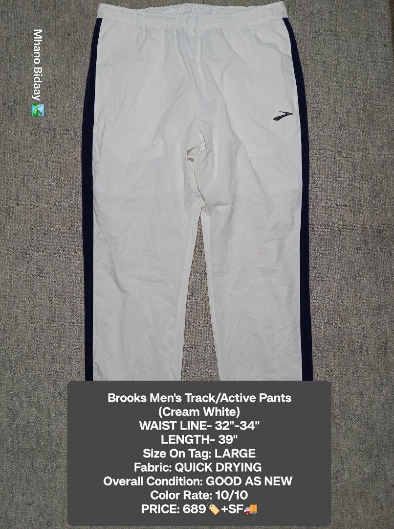 Brooks Men's Cream White Track Active Pants (Category: Activewear) located in Valencia. Submitted by mhano_bidaay_outdoors_218 (Listing ID 1462557922, Image 1). Description: - Brooks Men's Track Pants - Color: Cream White with Navy Blue Side Stripes - Size: Large - Waistline: Fits 32"-34" - Length: 39" - Fabric: Quick Drying - Condition: Good as New (Color 10/10).