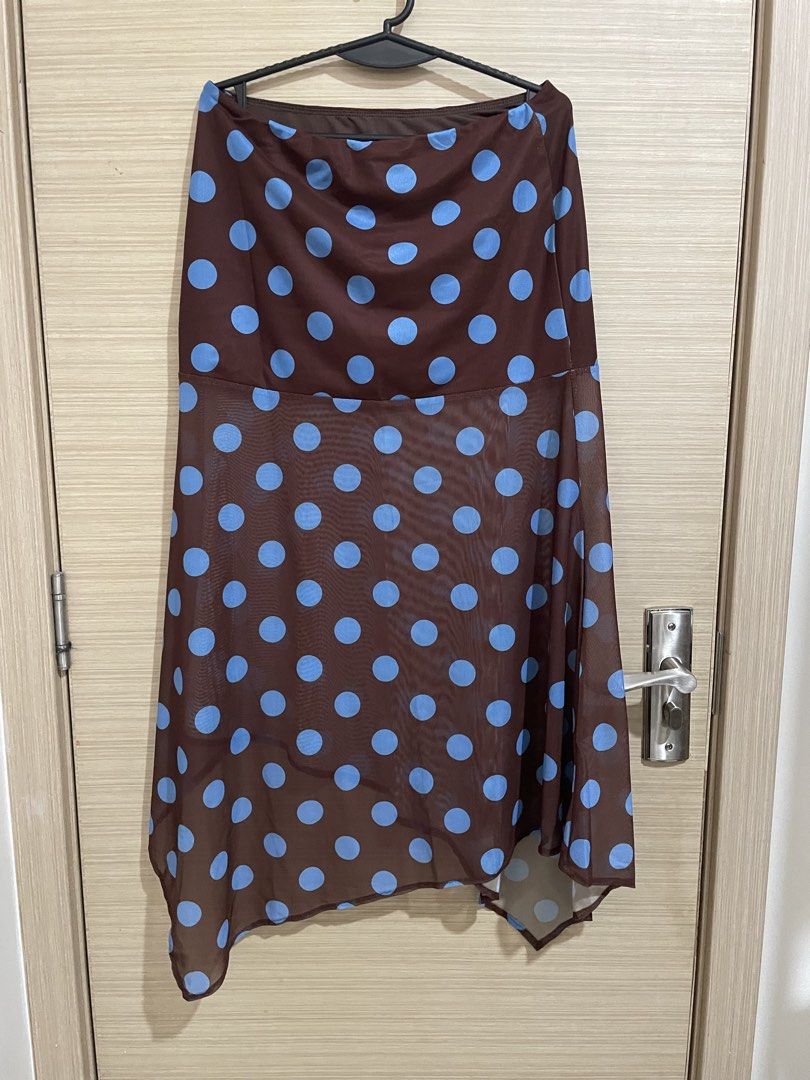 brown blue polka dots skirt (Category: Skirts) located in Manila. Submitted by bea_blkthrn (Listing ID 1462510292, Image 1). Description: brown blue polka dots skirt trendy, flowy dm for when worn pics 📍manila shipping via ggx/grab/lalamove *sf must be shouldered by buyer.